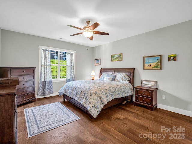 231 Leyland Cir, Hendersonville, NC 28792 - bedroom with baseboards, dark wood-type flooring, and ceiling fan