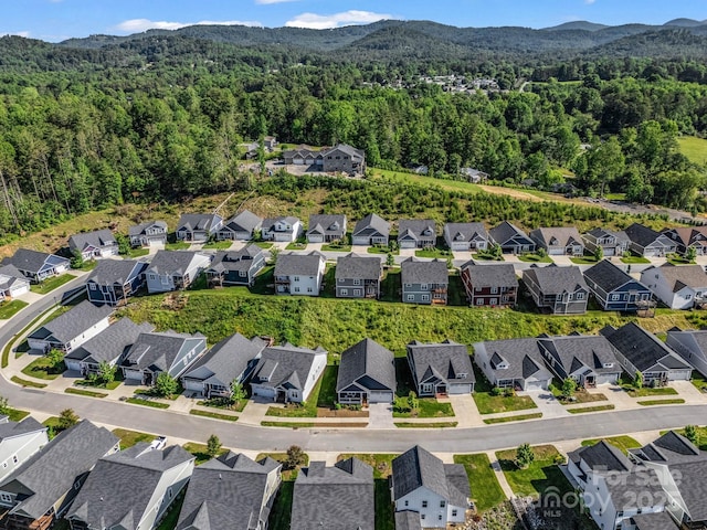 231 Leyland Cir, Hendersonville, NC 28792 - view of property location featuring a heavily wooded area, a mountain backdrop, and nearby suburban area