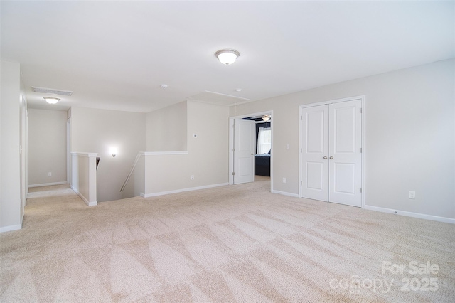 2014 Burton Point Ct, Waxhaw, NC 28173 - spare room featuring attic access and carpet
