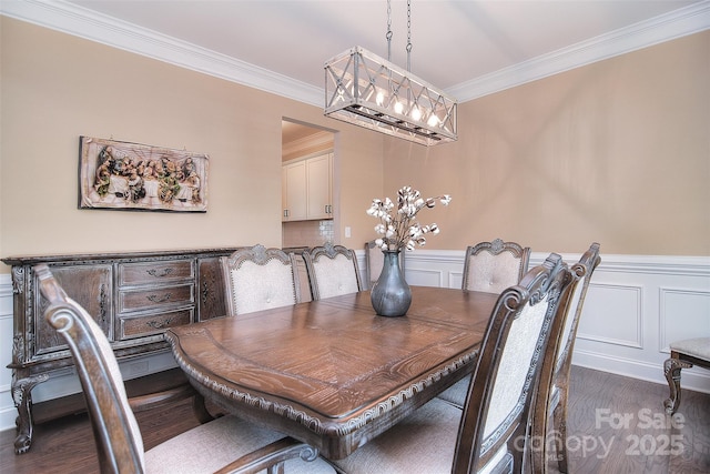 2014 Burton Point Ct, Waxhaw, NC 28173 - dining space featuring dark wood-style floors, crown molding, a wainscoted wall, a decorative wall, and a chandelier