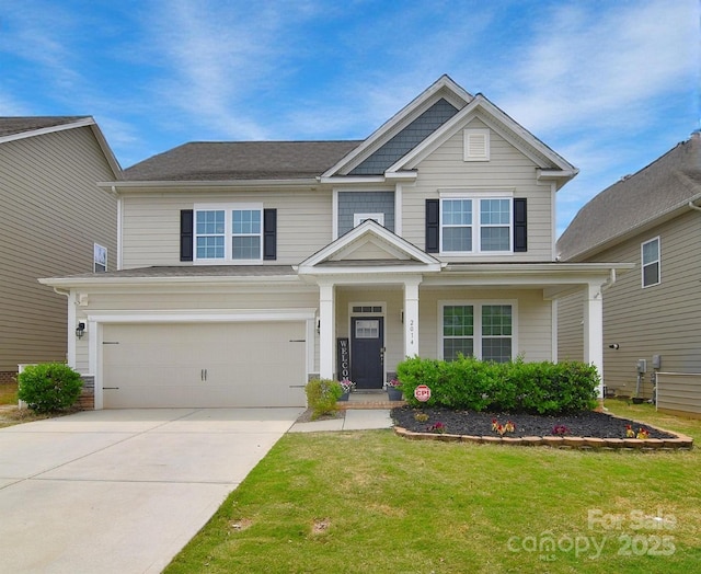 2014 Burton Point Ct, Waxhaw, NC 28173 - view of front of home with concrete driveway, an attached garage, and a front yard