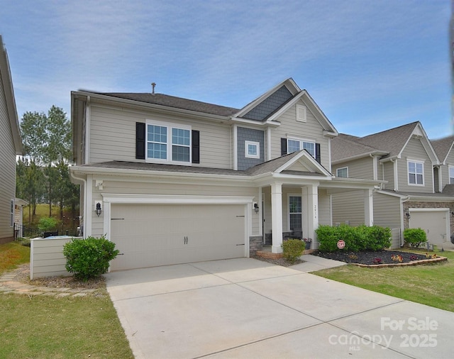 2014 Burton Point Ct, Waxhaw, NC 28173 - craftsman-style house with a garage, driveway, and a porch