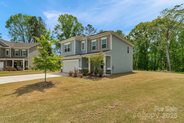 view of front of property with an attached garage, driveway, and a front yard