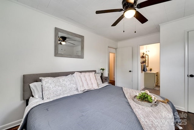 bedroom with ornamental molding, ensuite bathroom, and ceiling fan