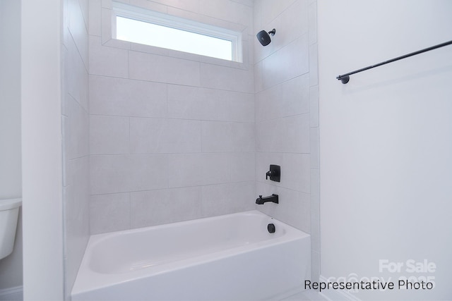 full bath with tub / shower combination and toilet
