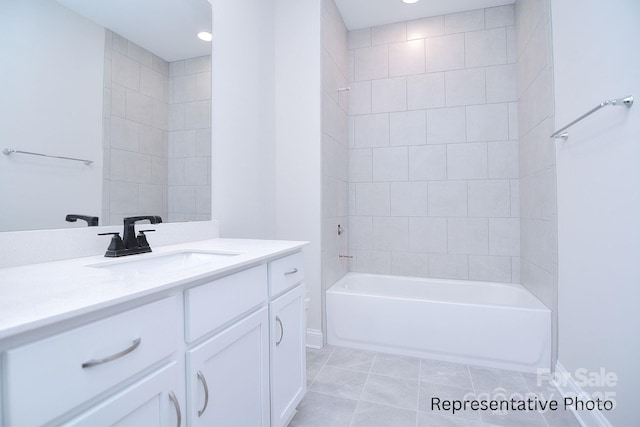 bathroom featuring vanity, baseboards, shower / tub combination, and tile patterned flooring