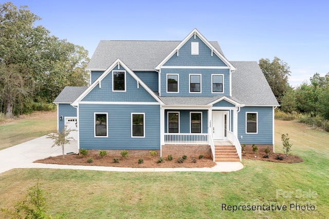 craftsman-style home featuring covered porch, concrete driveway, roof with shingles, and a front lawn