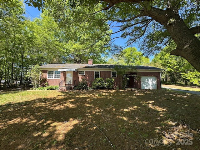 2703 34th Street Pl NE, Hickory, NC 28601 - ranch-style home featuring an attached garage, driveway, a chimney, and brick siding