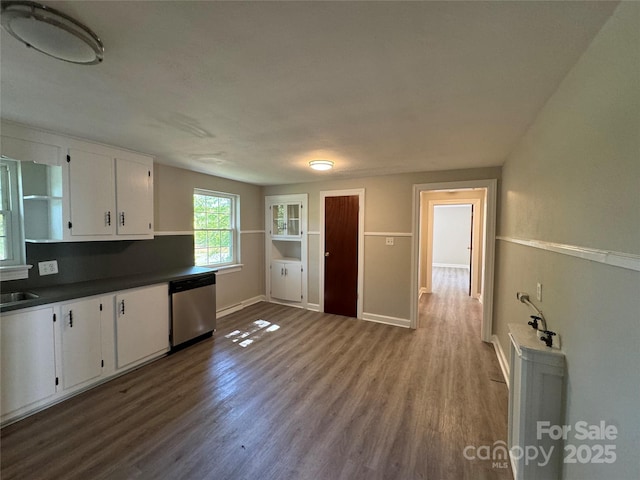 2703 34th Street Pl NE, Hickory, NC 28601 - kitchen featuring white cabinets, dark countertops, baseboards, dishwasher, and dark wood-type flooring
