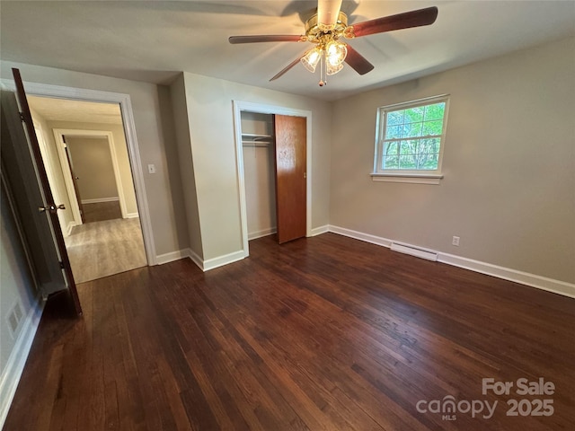 2703 34th Street Pl NE, Hickory, NC 28601 - unfurnished bedroom with dark wood finished floors, visible vents, a closet, baseboards, and ceiling fan