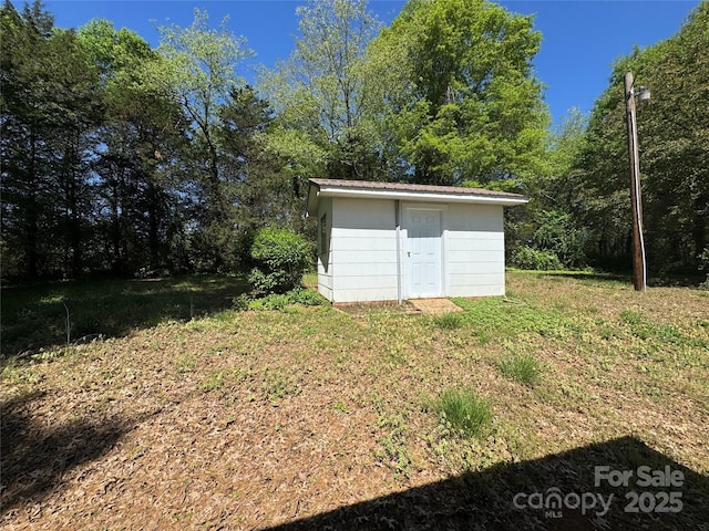 2703 34th Street Pl NE, Hickory, NC 28601 - view of shed featuring a view of trees