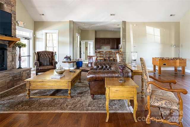living room with wood finished floors and visible vents