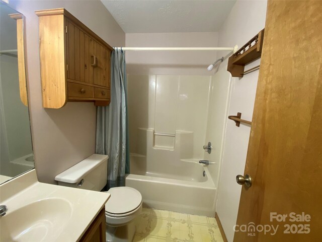 full bathroom with shower / tub combo, toilet, vanity, and tile patterned floors