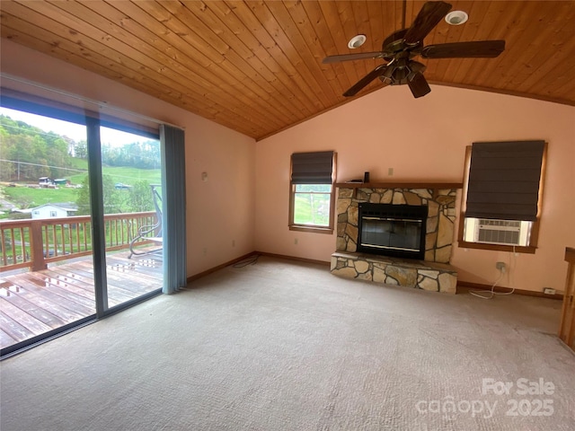unfurnished living room with carpet, lofted ceiling, wood ceiling, and ceiling fan