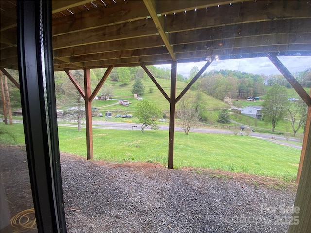 view of home's community with a yard