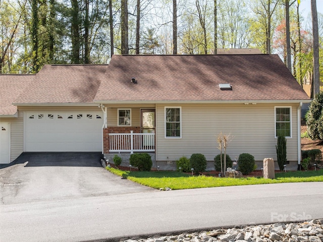 210 Allen Paul Dr, Hendersonville, NC 28791 - view of front of house with an attached garage, driveway, covered porch, and brick siding
