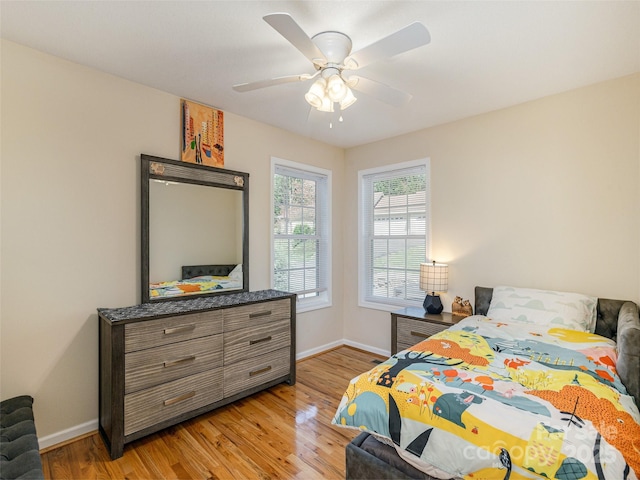 210 Allen Paul Dr, Hendersonville, NC 28791 - bedroom with ceiling fan, baseboards, and light wood-style floors