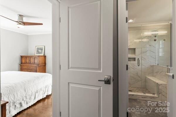 241 Wakefield Dr Unit C, Charlotte, NC 28209 - bedroom with ornamental molding and wood finished floors