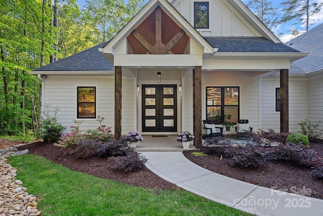 127 Holt Ln, Mooresville, NC 28117 - doorway to property with board and batten siding, a porch, and roof with shingles