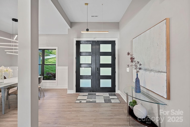 127 Holt Ln, Mooresville, NC 28117 - entryway with wood finished floors and visible vents