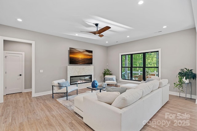 127 Holt Ln, Mooresville, NC 28117 - living area with baseboards, recessed lighting, and light wood-style flooring