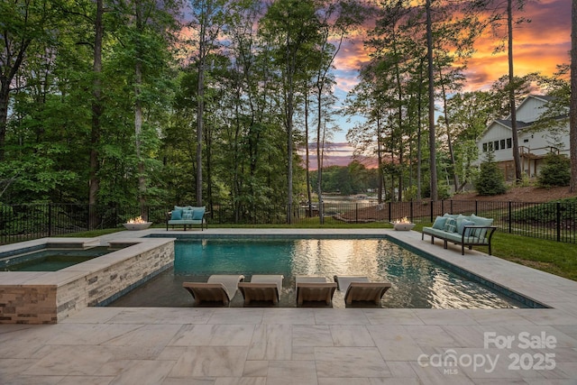 127 Holt Ln, Mooresville, NC 28117 - view of pool featuring an in ground hot tub, a fenced in pool, a fenced backyard, and a patio area