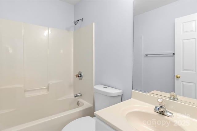full bath with washtub / shower combination, vanity, and toilet