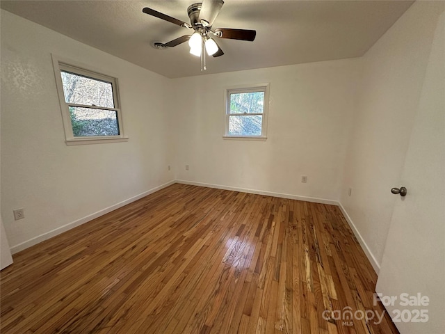 5381 State Highway 197 S Unit 3, Burnsville, NC 28714 - empty room with hardwood / wood-style flooring, baseboards, and a ceiling fan