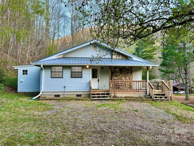 5381 State Highway 197 S Unit 3, Burnsville, NC 28714 - bungalow-style house with a porch, crawl space, and metal roof
