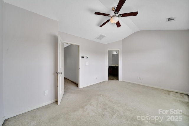 9862 Walkers Glen Dr NW, Concord, NC 28027 - unfurnished bedroom with lofted ceiling, light colored carpet, baseboards, ensuite bathroom, and a ceiling fan
