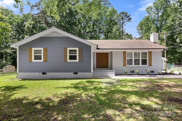 ranch-style house with roof with shingles, fence, a front yard, crawl space, and a chimney