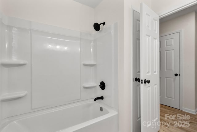 full bath with wood finished floors