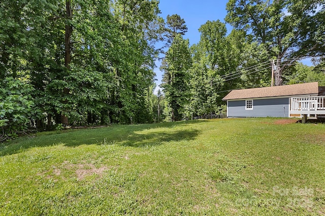 view of yard featuring a deck