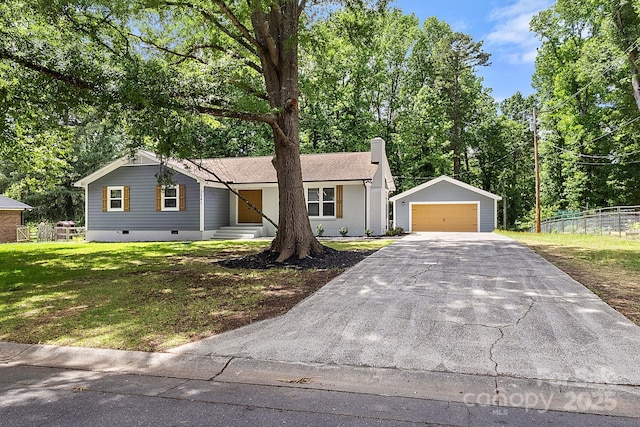 ranch-style home with an outdoor structure, a front lawn, a chimney, crawl space, and a detached garage