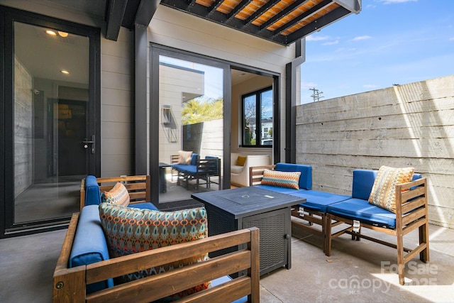 view of patio with fence and an outdoor living space