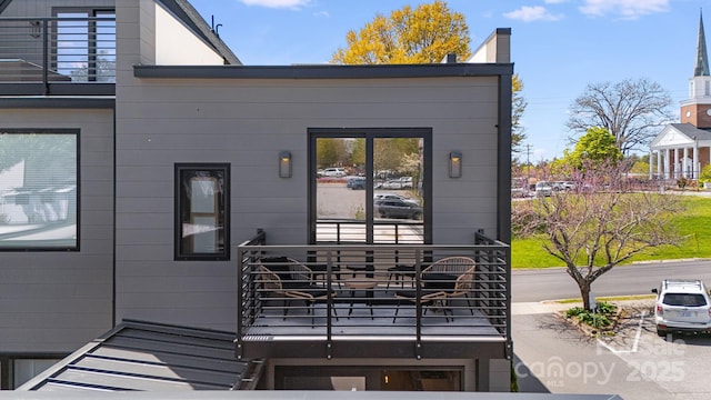 exterior space featuring a balcony