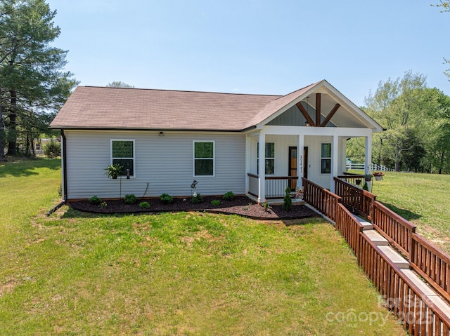 3121 Suffolk Dr, Shelby, NC 28152 - view of front of home with a front lawn, covered porch, and a shingled roof
