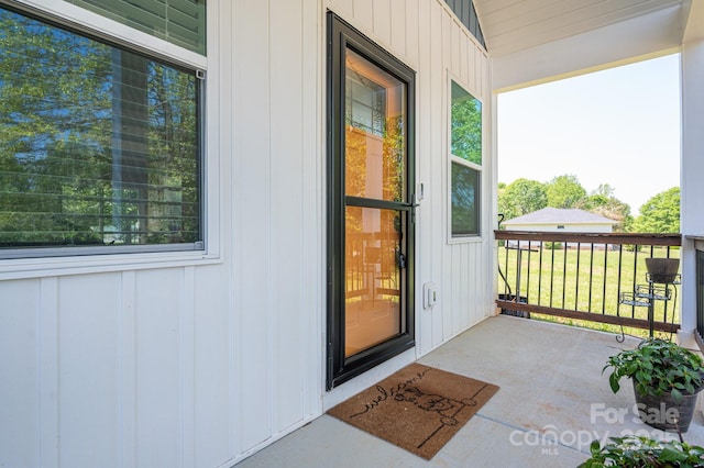 3121 Suffolk Dr, Shelby, NC 28152 - doorway to property with a porch and board and batten siding