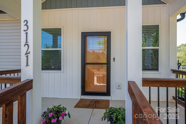 3121 Suffolk Dr, Shelby, NC 28152 - view of exterior entry with a porch and board and batten siding