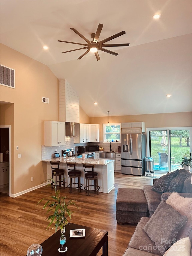 3121 Suffolk Dr, Shelby, NC 28152 - living area with ceiling fan, high vaulted ceiling, and wood finished floors