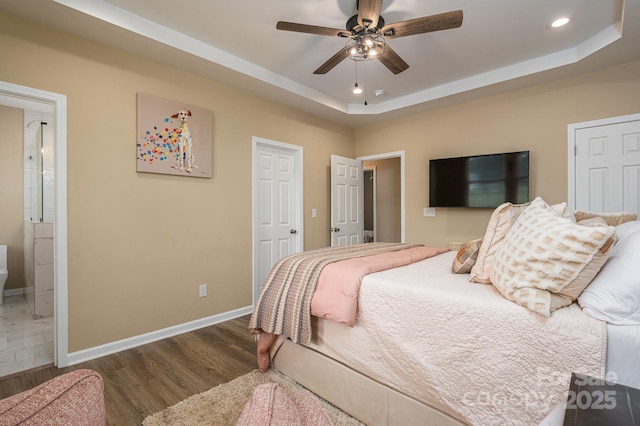 3121 Suffolk Dr, Shelby, NC 28152 - bedroom with a raised ceiling, baseboards, recessed lighting, wood finished floors, and connected bathroom