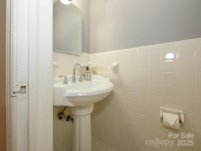 1596 Clayton Dr, Charlotte, NC 28203 - bathroom with a wainscoted wall and tile walls