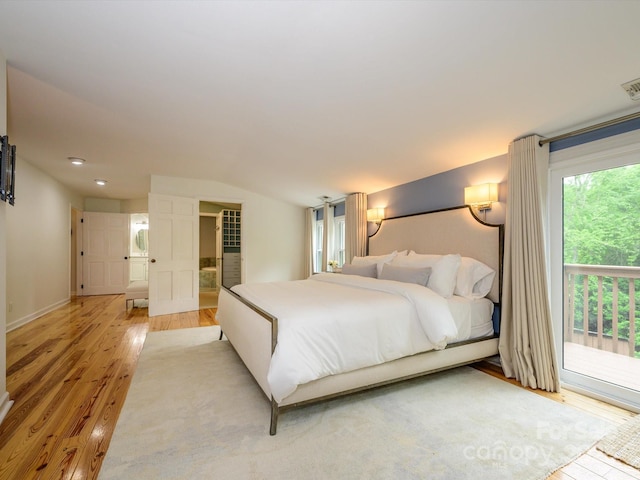 1596 Clayton Dr, Charlotte, NC 28203 - bedroom featuring access to outside, light wood finished floors, and visible vents