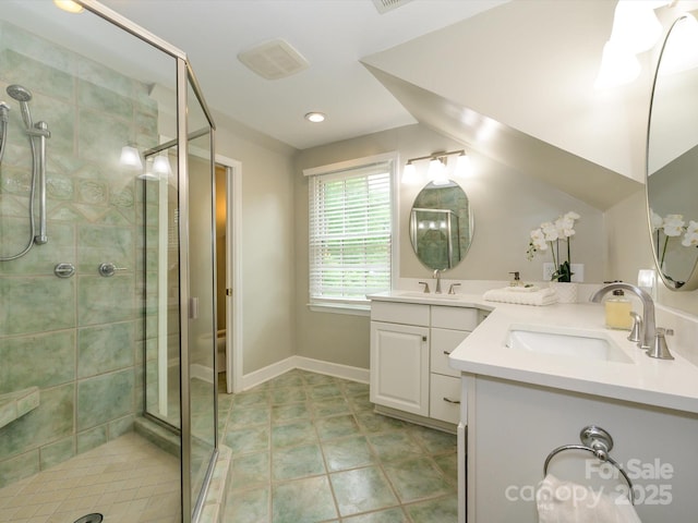 1596 Clayton Dr, Charlotte, NC 28203 - bathroom with vanity, visible vents, baseboards, recessed lighting, and a shower stall