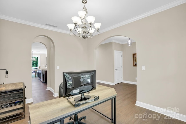 2417 Labelle Dr, Waxhaw, NC 28173 - office area featuring arched walkways, a chandelier, wood finished floors, and ornamental molding