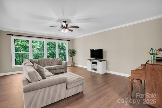 2417 Labelle Dr, Waxhaw, NC 28173 - living room with a ceiling fan, baseboards, crown molding, and dark wood-type flooring