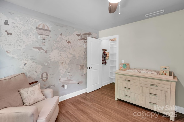 2417 Labelle Dr, Waxhaw, NC 28173 - living area with wood finished floors, a ceiling fan, and baseboards