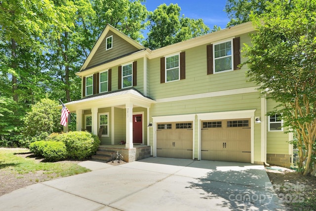 2417 Labelle Dr, Waxhaw, NC 28173 - view of front of house featuring an attached garage, driveway, and a porch