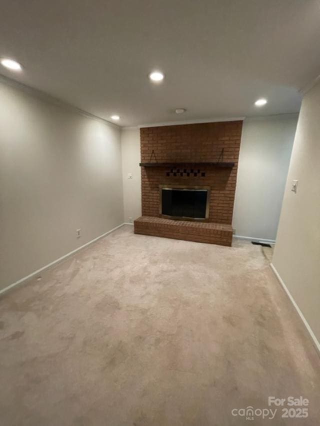 127 Edgeway Rd, Mooresville, NC 28117 - unfurnished living room with recessed lighting, a fireplace, light colored carpet, and baseboards