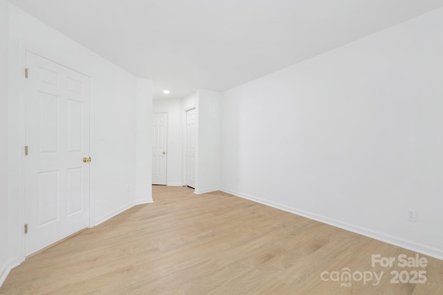 6523 Clavell Ln Unit I, Charlotte, NC 28210 - spare room featuring baseboards, recessed lighting, and light wood-style floors
